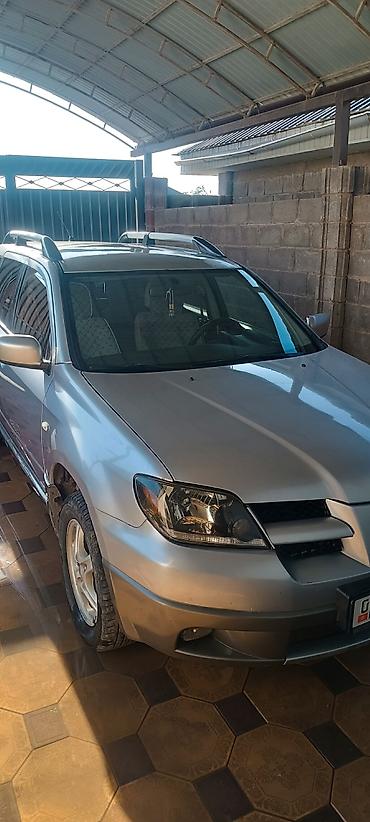 Другие автомобили: Mitsubishi outlander 2004 2.4 Кроссовер серебристого цвета с — 11