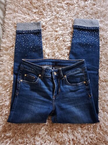 Farmerke: Ženske farmerice od tamno-plavog teksasa sa ravnim krojem i srednjim na lalafo.rs — 4 Farmerke: Ženske farmerice od tamno-plavog teksasa sa ravnim krojem i srednjim — 4