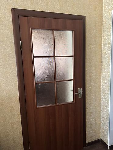 купить кун: Межкомнатные двери из шпона/ламината в тёплом оттенке ореха с матовым — 2