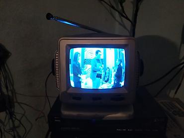 elektrikli qızdırıcılar: Portativ mini TV/radio cihazı televizor işləkdir hec bir problemi — 1