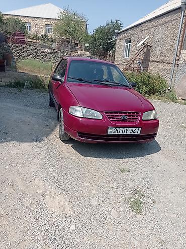 lasvit 1998: Kia Avella: 1.5 l | 1998 il Sedan — 10