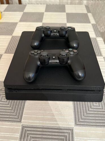 ps4 oyunları azerbaycan: PlayStation 4 1TB Konsolu Satılır Az istifadə olunmuş PlayStation 4