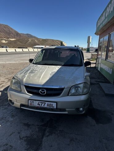 подлокотник на ниву: Mazda Tribute: 2003 г., 2 л, Автомат, Бензин, Кроссовер