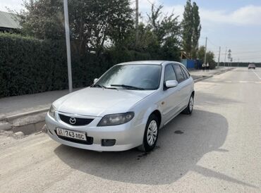 вентилятор на гольф 3: Mazda Familia: 2003 г., 1.6 л, Механика, Бензин, Хэтчбэк
