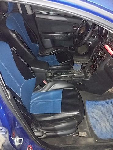 cx 9: Mazda 3: 2006 г., 1.8 л, Автомат, Бензин, Хэтчбэк — 1