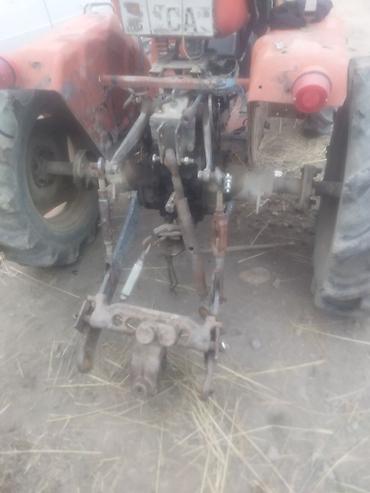 Другие мини-тракторы: Компактный колесный тракт (мини-трактор) красного цвета. Основные — 2