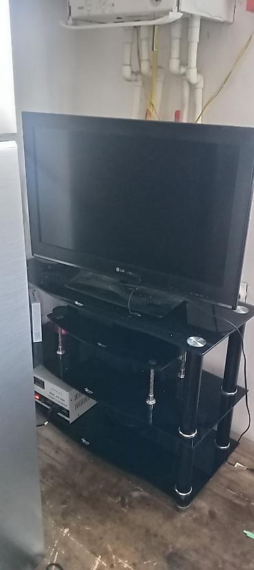 TV altlığı: LG televizor + 3 rəfli TV stendi dəsti Məhsul tərkibi: - LG LCD/LED — 4