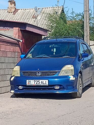 хонда шаран: Минивэн Honda Stream синего цвета с рейлингами на крыше. Автомобиль