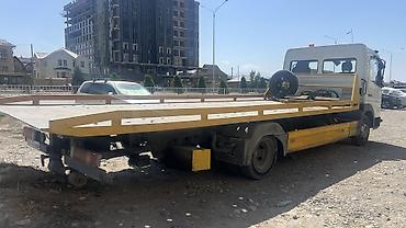 Услуги эвакуатора: С лебедкой — 12