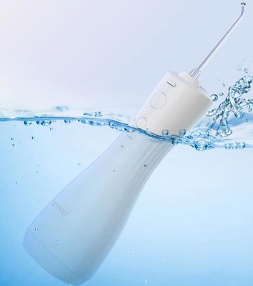 device: Ирригатор Портативный, Новый — 3