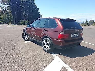 te 28 traktor satisi: BMW X5 (E53), bordoya çalan tünd qırmızı rəngdə SUV. Texniki və — 3