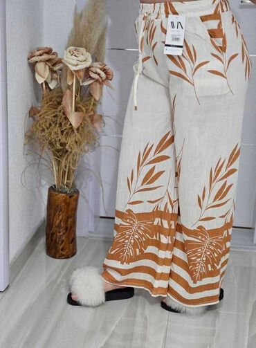 Pantalone: 06. Pantalone 
M/L i Xl/2xl — 12
