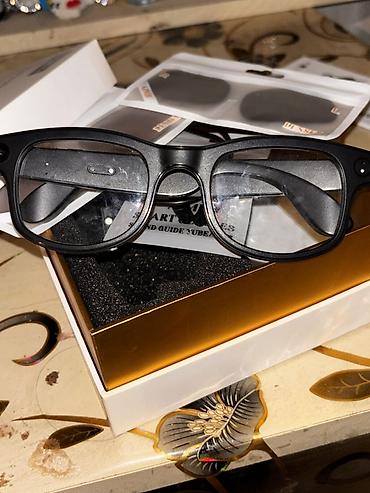 ağıllı eynək: AI Smart Glasses – “Hey Glasses” Xüsusiyyətlər: - 5 MP daxili kamera — 1