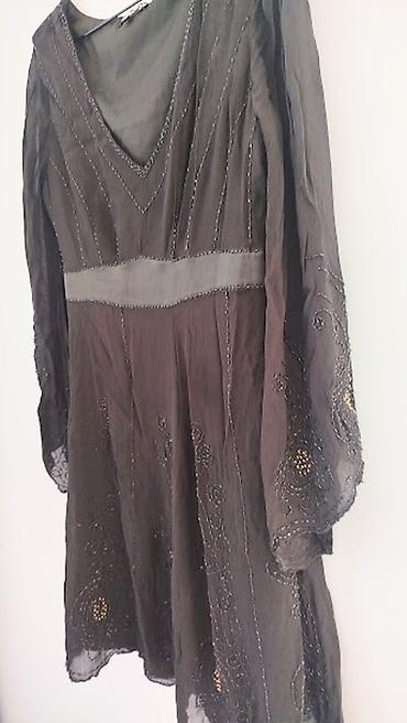 Elegantna haljina vel. 40 Ramena 42,pazuh 50,struk 42-48,duzina 90cm