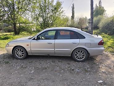 армянский учет: Mazda 626: 1999 г., 1.8 л, Механика, Бензин, Седан — 3