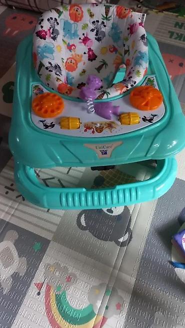 Guralice za bebe: Hodalica za bebe UniCare - Stabilna plastična osnova sa čeličnim — 1