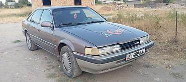 Транспорт: Mazda 626: 1992 г., 2 л, Механика, Бензин, Седан — 1