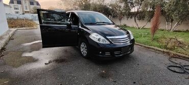 Nissan: Nissan Tiida: 1.5 l | 2011 il Hetçbek