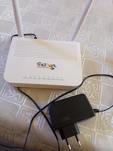 router qiymetleri: İki ədəd Wi‑Fi marşrutizator və adapterləri.Razilasma yolu ilə Təcili — 5