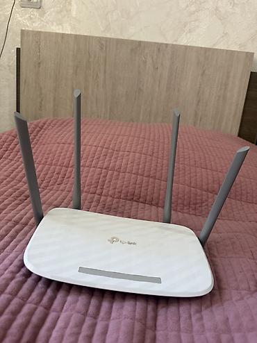роутер archer: Wi‑Fi роутер TP‑Link с четырьмя внешними антеннами Описание: - — 1