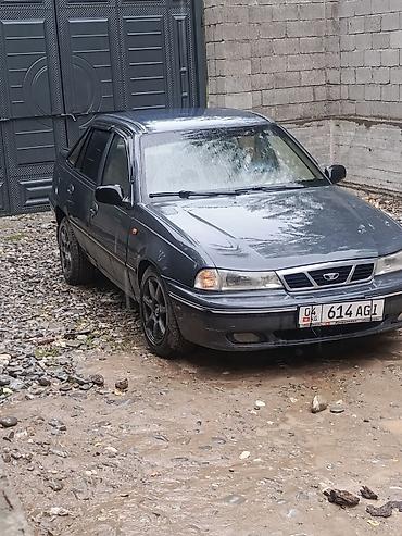 салон машины: Daewoo Nexia: 2003 г., Бензин, Седан — 1