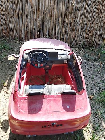 qırmızı gül: Uşaq üçün elektrikli minik maşını toklarinda problemi var akmiyatorla — 3
