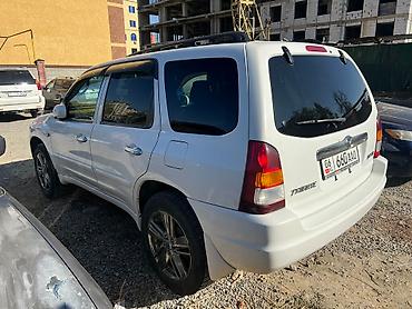 аренда mazda 323: Mazda Tribute: 2002 г., 2 л, Автомат, Бензин, Внедорожник — 3
