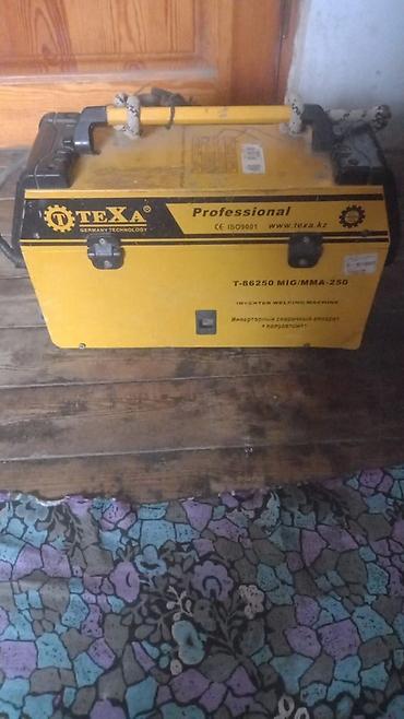 qaynax: TEXA T-86250 MIG/MMA-250 inverter qaynaq aparatı. Model üzərində — 2