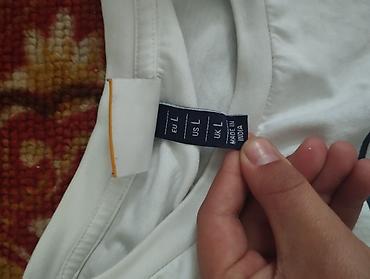 Футболки: Футболка Ellesse, белая, с крупным фирменным логотипом на груди — 6