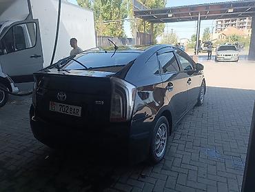 byd e2 2025: Toyota Prius: 2012 г., 1.8 л, Вариатор, Гибрид, Хэтчбэк — 2