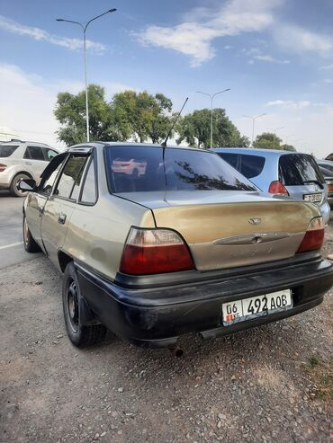 срочно срочно продаю горит: Daewoo Nexia: 2006 г., 1.5 л, Механика, Бензин