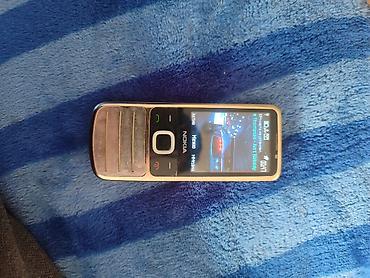 Nokia 6700 Slide, Б/у, < 2 ГБ, цвет - Серебристый, 1 SIM
