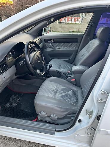 daewoo gentra oluxanasi: DAYVO GENTRA Xüsusiyyətlər: - Kuzov: ağ rəngli sedan, tünd bənövşəyi — 8