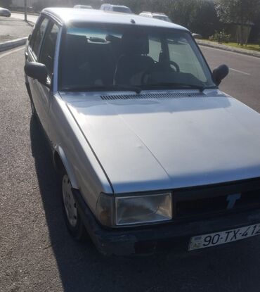 Tofas: Tofaş Şahin/Doğan (sedan) – gümüşü rəng Xüsusiyyətlər: - Kuzov: 4 — 11