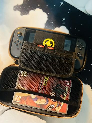 Nintendo Switch: Nintendo Switch (модель с док-станцией) Комплектация: - консоль — 9