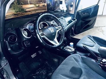 кю 7: Honda Fit: 2009 г., 1.5 л, Автомат, Бензин, Хэтчбэк — 9