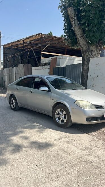 купить фары на ниву: Седан Nissan Primera P12 серебристого цвета с характерными фарами и