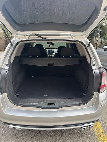 avtomobil apteçkası: Opel Astra: 1.3 l | 2008 il 306890 km Universal — 5