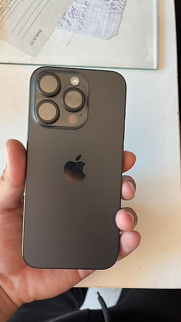 наушники pro 5: IPhone Pro в тёмном цвете. Смартфон Apple с тройной основной камерой — 1