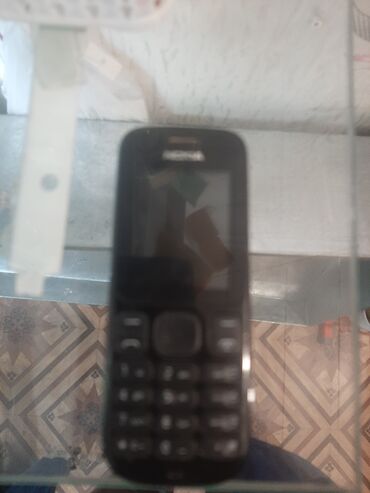 100 telefon: Nokia 106, rəng - Qara, Düyməli