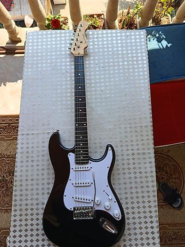 Gitaralar: Elektron gitara, 6 sim, İşlənmiş, Ünvandan götürmə — 2
