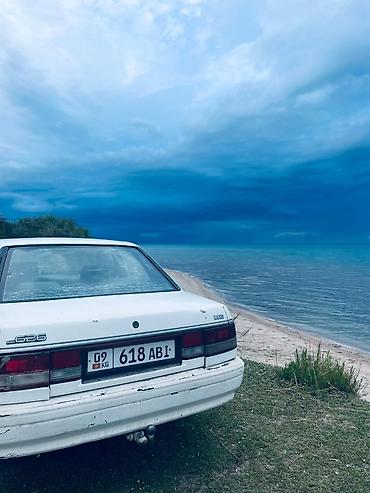 авто элек: Mazda 626: 1991 г., 2 л, Кол менен иштөөчү, Седан — 3