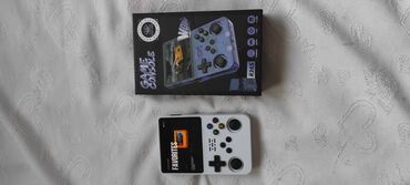 Digər oyun və konsollar: Portativ retro oyun konsolu - Korpus: ağ rəng, yığcam qatlanan — 7