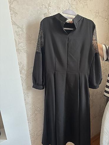 Qadın geyimləri: Qara rəngdə zərif qadın donu - Model: midi uzunluqda, yüngül A-kəsim — 3