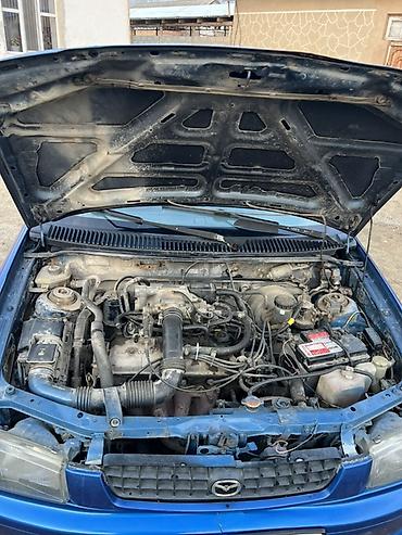 Mazda: Mazda Demio: 1998 г., 1.3 л, Ручные, Бензин, Хэтчбэк — 12