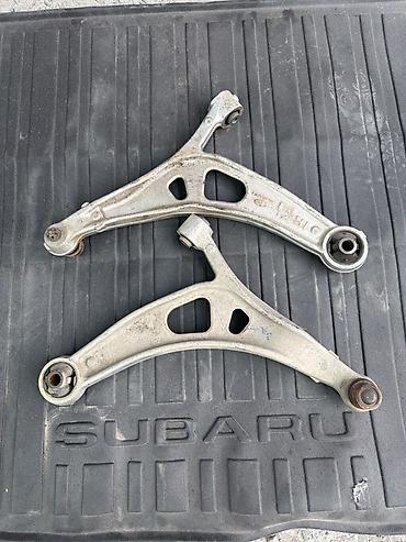 Пара передних рычагов подвески Subaru - Тип: нижние передние рычаги в