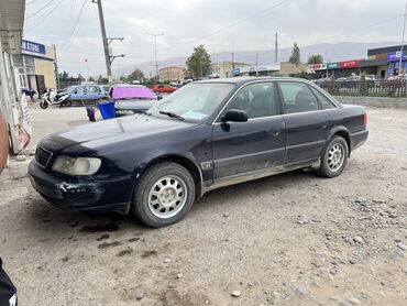 бу запчасти на корейские автомобили: Audi A6 седан (C4), тёмно‑синий цвет. Кузов и экстерьер: - 4 двери