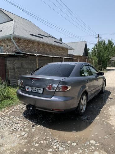 мопеды самурай: Седан Mazda 6 серого цвета, идеально подходящий для городских поездок