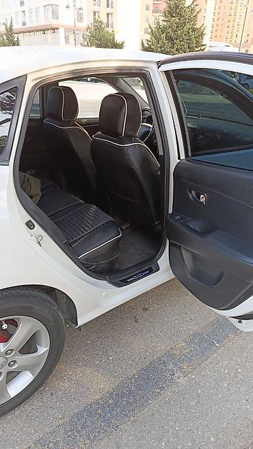 taube kondisioner: Hyundai Elantra, ağ rəngli sedan.nömre üstünde verilir peredok arxa — 9