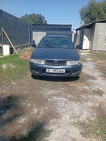 руль windom: Mitsubishi Carisma: 1999 г., Седан — 5